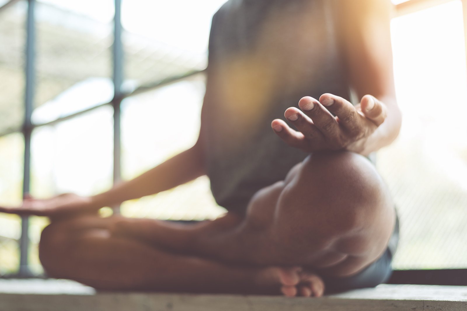 young attractive boy exercising,asian man practicing meditation
